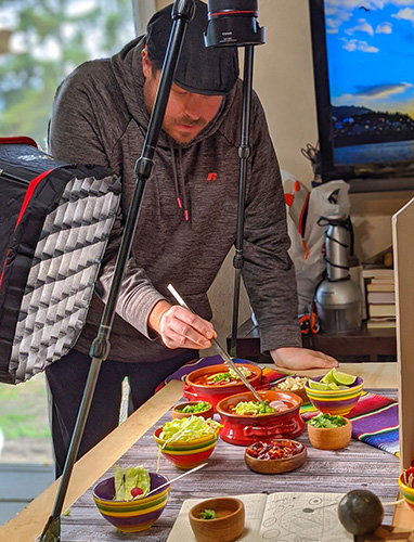 Behind-the-scenes view of a photoshoot capturing commercial food photography for a local client.